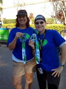 Michelle and I show off the awesome 2013 OUC Half medal